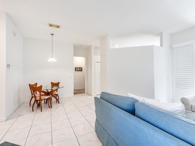 living room with light tile patterned floors