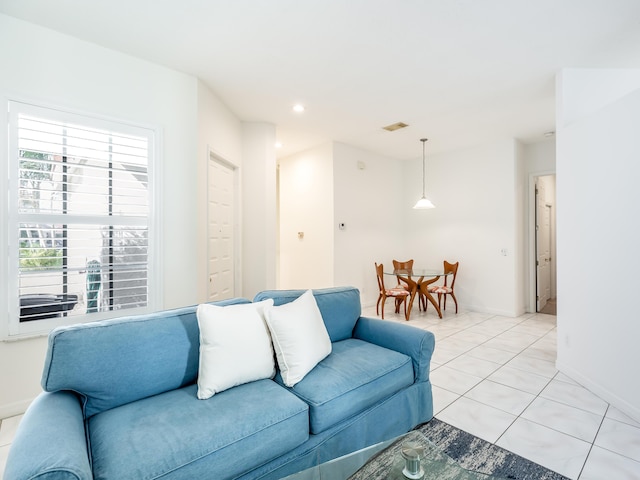 living room featuring light tile patterned floors