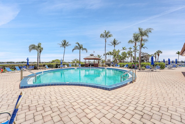 view of pool featuring a patio area