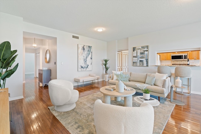 living room with light hardwood / wood-style floors