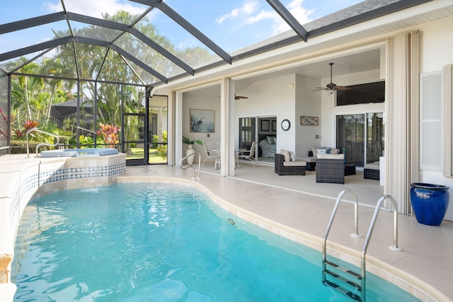 view of swimming pool featuring an outdoor hangout area, ceiling fan, a lanai, an in ground hot tub, and a patio