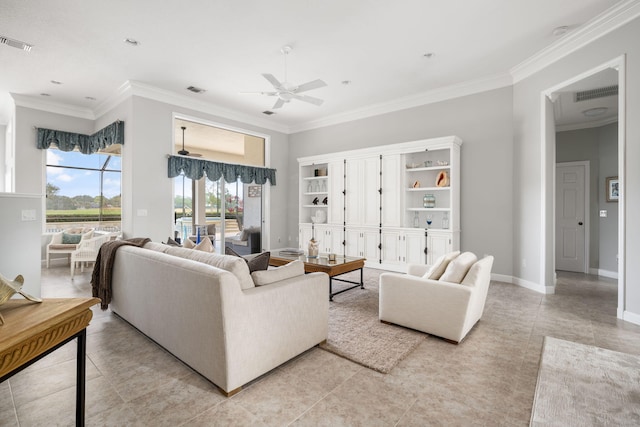 tiled living room with ceiling fan and ornamental molding