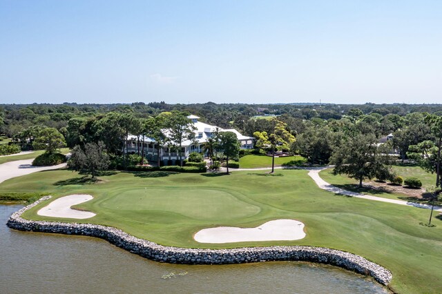 view of home's community with a water view