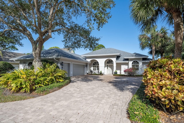 view of front of property featuring a garage