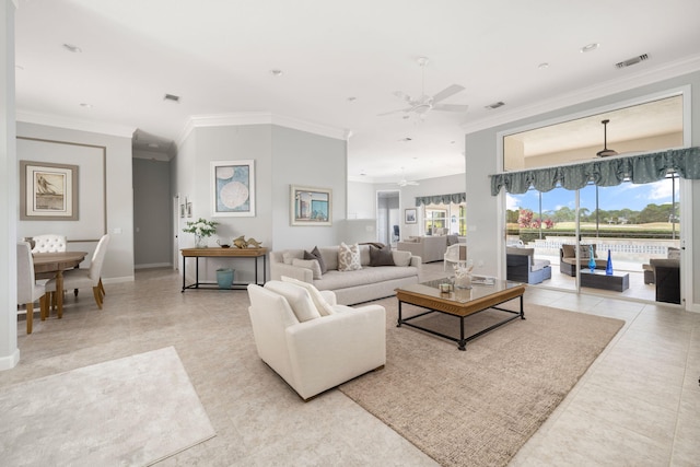 living room featuring ceiling fan, crown molding, and light tile patterned flooring