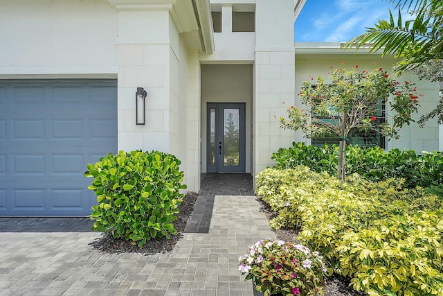 entrance to property featuring a garage