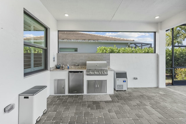 view of patio / terrace with grilling area and exterior kitchen