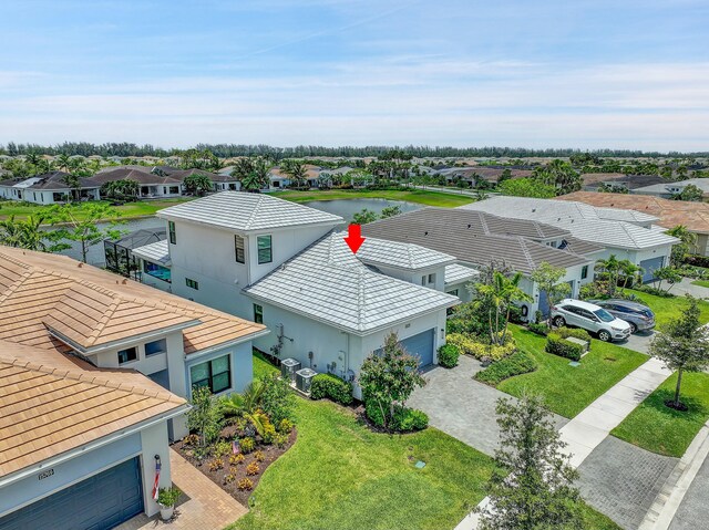 bird's eye view with a water view