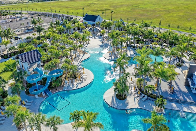 view of swimming pool featuring a water slide