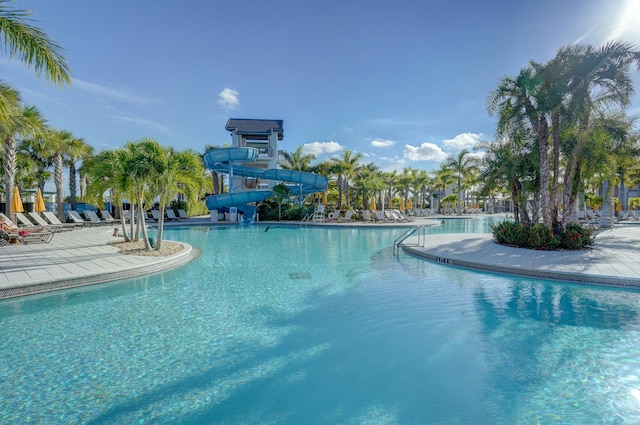 view of pool featuring a water slide