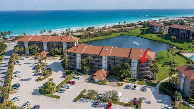 drone / aerial view featuring a water view