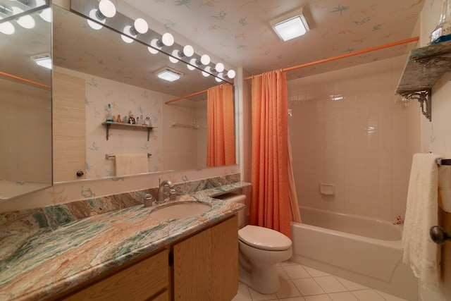 full bathroom featuring tile patterned flooring, vanity, shower / tub combo, and toilet