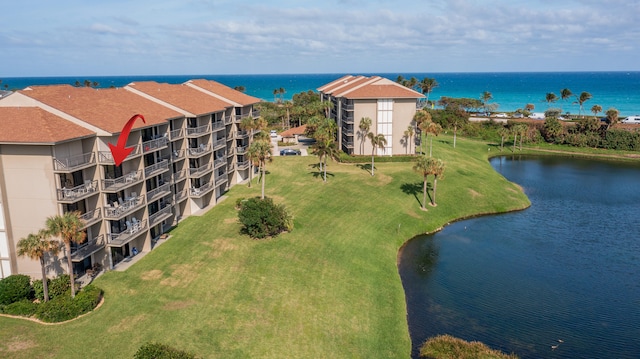 bird's eye view with a water view