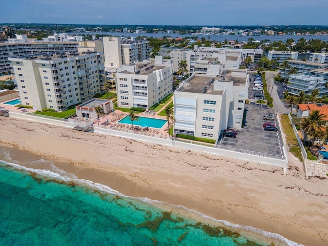 bird's eye view with a view of the beach and a water view