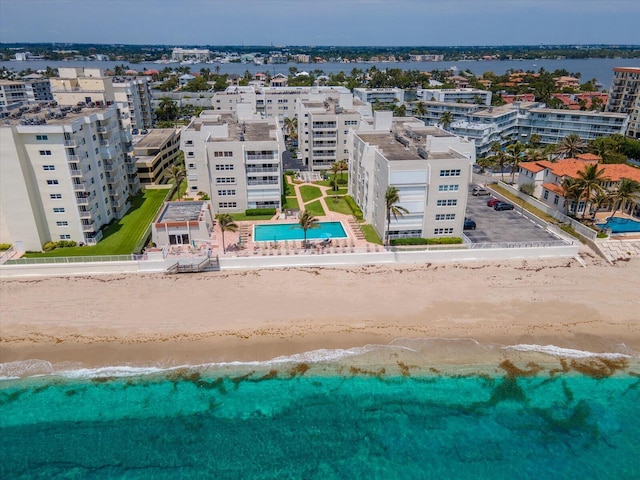 aerial view with a beach view and a water view