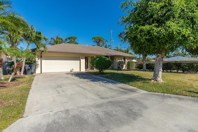 single story home with a front lawn and a garage