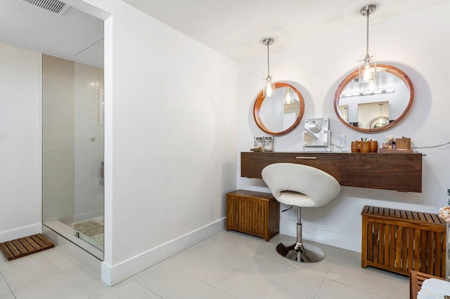 bathroom featuring a shower and tile patterned floors