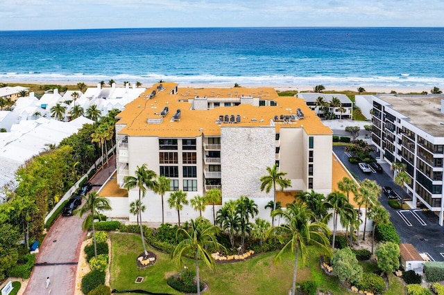 bird's eye view with a beach view and a water view