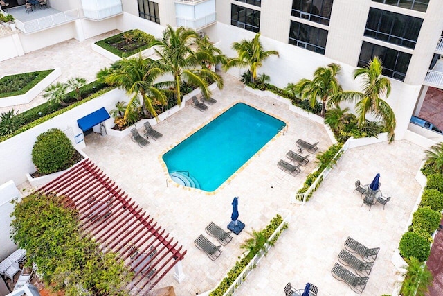 view of swimming pool with a patio area