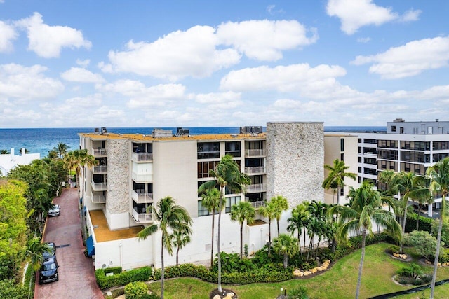 view of property with a water view