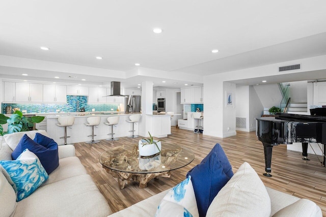 living room featuring light hardwood / wood-style floors