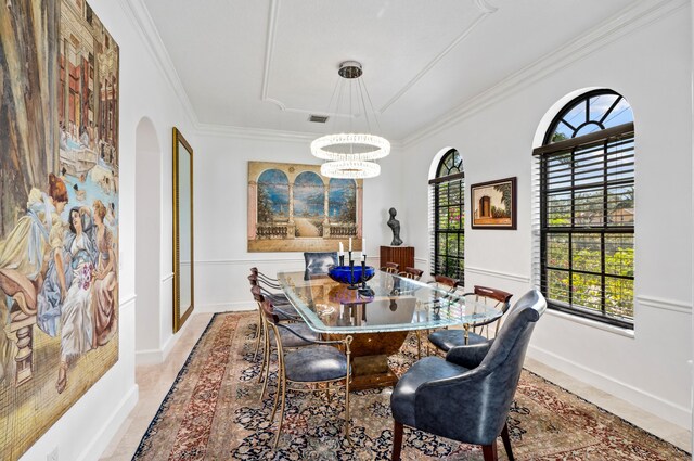 office area featuring built in shelves, ceiling fan, and ornamental molding