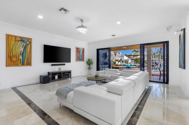 living room featuring crown molding and french doors