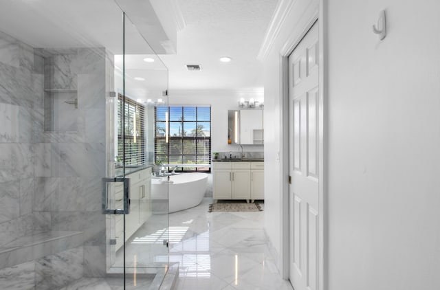 bathroom with ornamental molding, vanity, and shower with separate bathtub