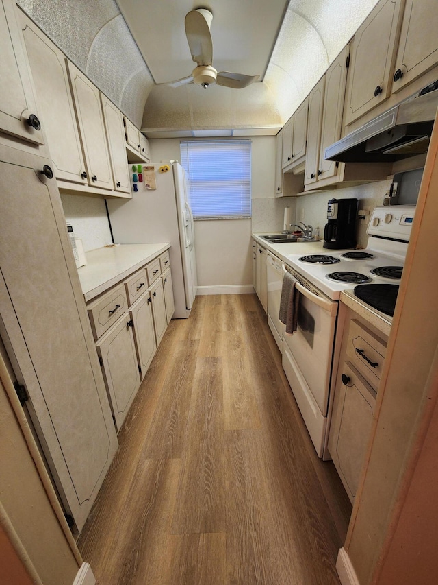 kitchen featuring white appliances, light hardwood / wood-style flooring, and ceiling fan