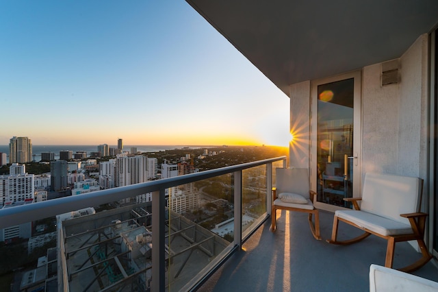 view of balcony at dusk