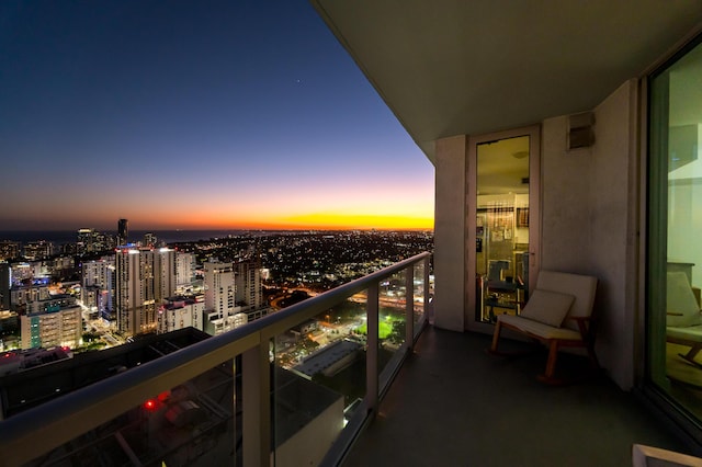 view of balcony at dusk