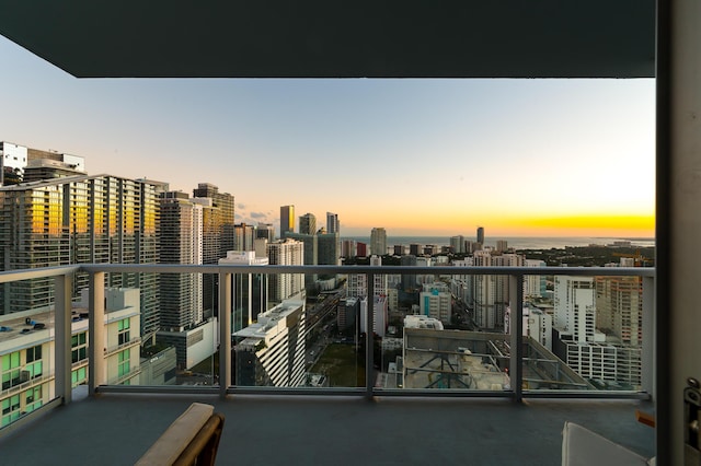 view of balcony at dusk