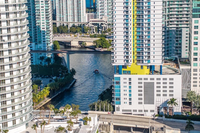 birds eye view of property featuring a water view