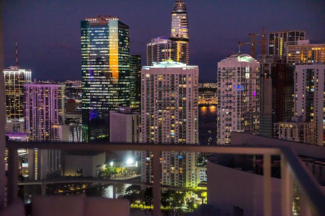 property's view of city featuring a water view