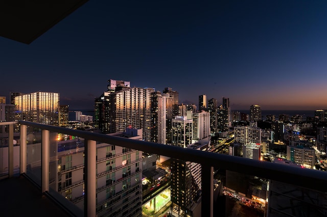 view of balcony at dusk