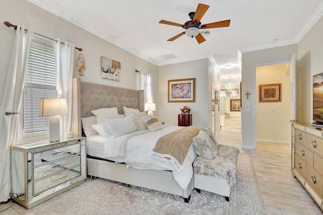 bedroom featuring ceiling fan with notable chandelier, ornamental molding, light hardwood / wood-style flooring, and ensuite bath