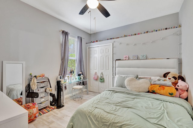 bedroom featuring light wood-type flooring and ceiling fan