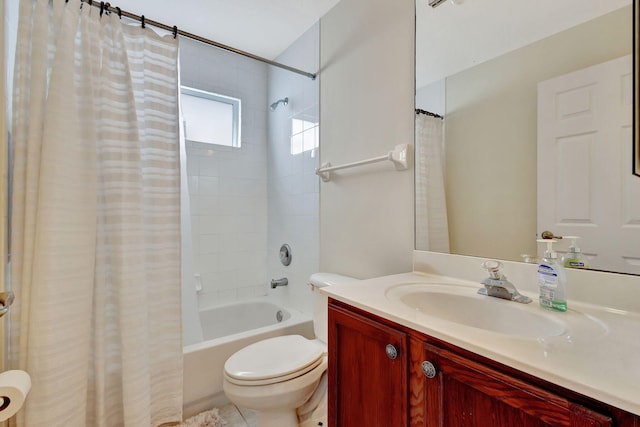 full bathroom featuring shower / tub combo with curtain, vanity, and toilet