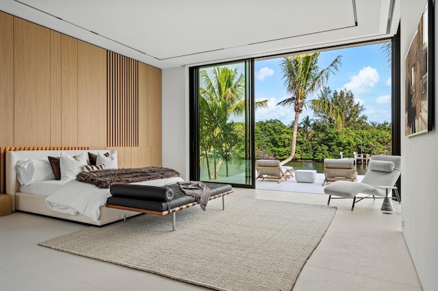 bedroom with floor to ceiling windows