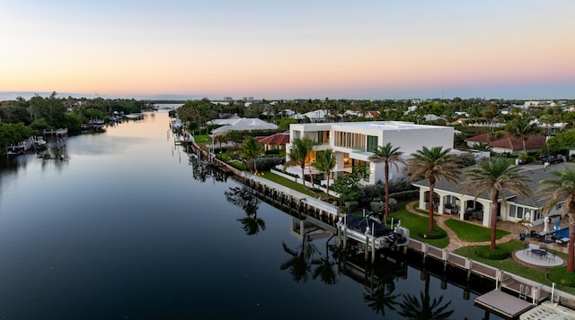 aerial view with a water view and a residential view