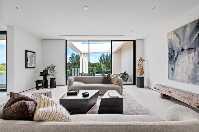 living room featuring floor to ceiling windows