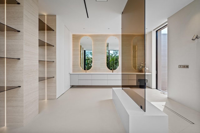 35 Spoonbill Rd, Manalapan, FL 33462 - bathroom featuring a tub to relax in and plenty of natural light
