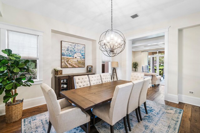 living room featuring french doors, built in features, ceiling fan, and a healthy amount of sunlight