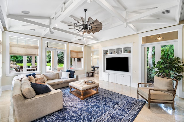 living room with beam ceiling, coffered ceiling, ceiling fan, and french doors