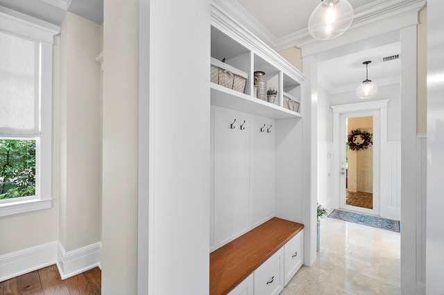 mudroom with ornamental molding