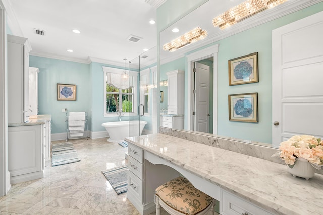 bathroom featuring ornamental molding, vanity, and a bathing tub