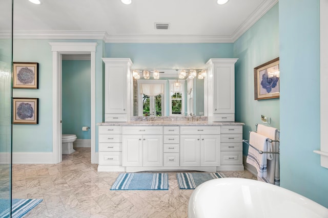 bathroom featuring vanity, a bath, ornamental molding, and toilet