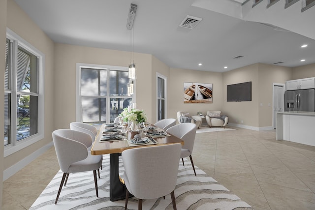 dining room with light tile patterned floors