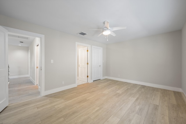 unfurnished bedroom with ceiling fan and light hardwood / wood-style floors