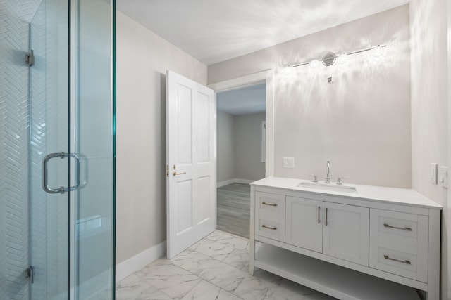 bathroom with vanity and walk in shower